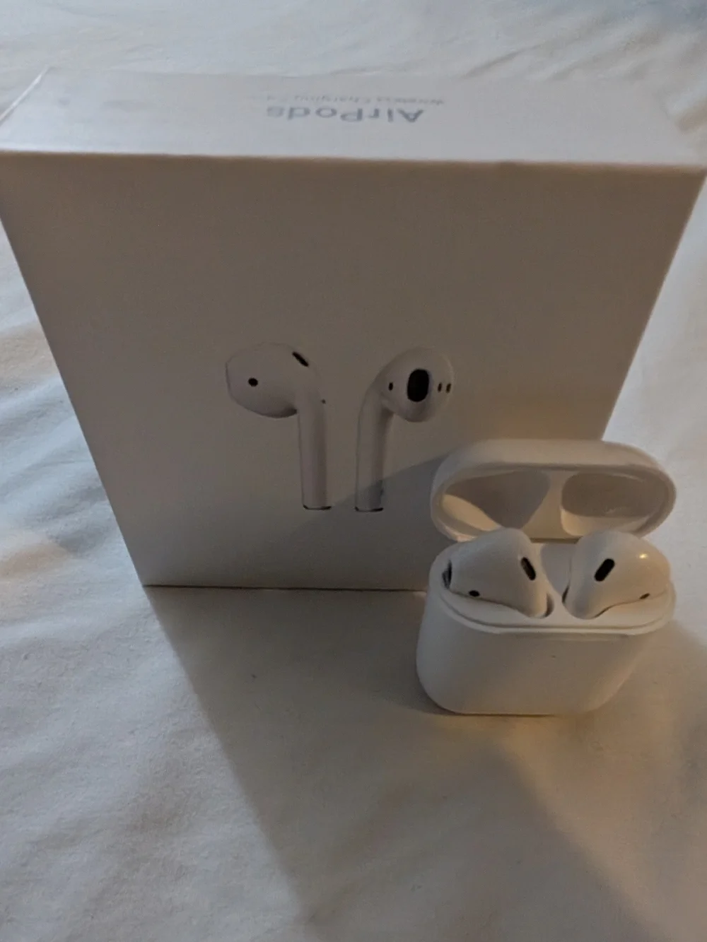Apple AirPods with Charging Case - White